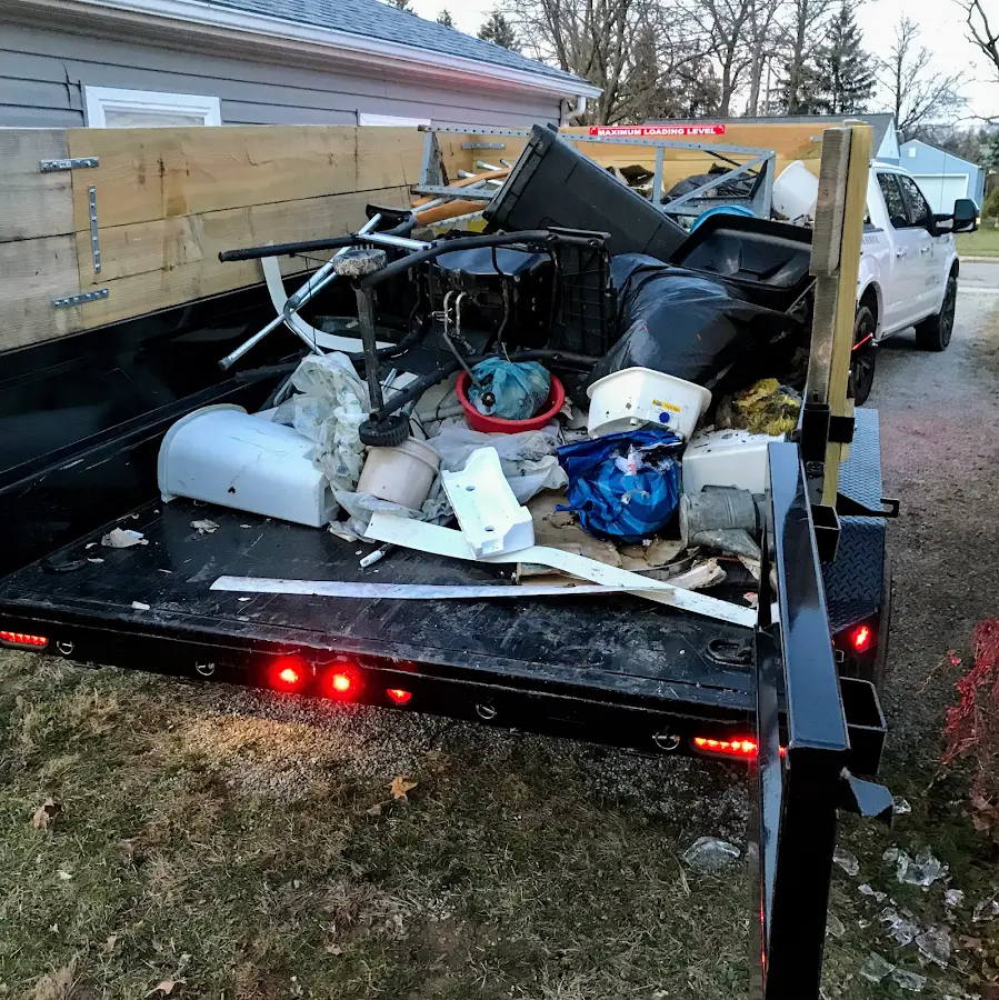 Roll-off dumpster delivered to a residential driveway in Derby